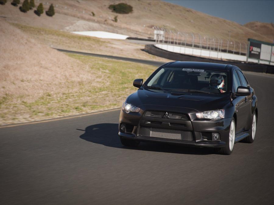  Mitsubishi Lancer Evolution X SE 2009 года  (US) (фото 4 из 11)